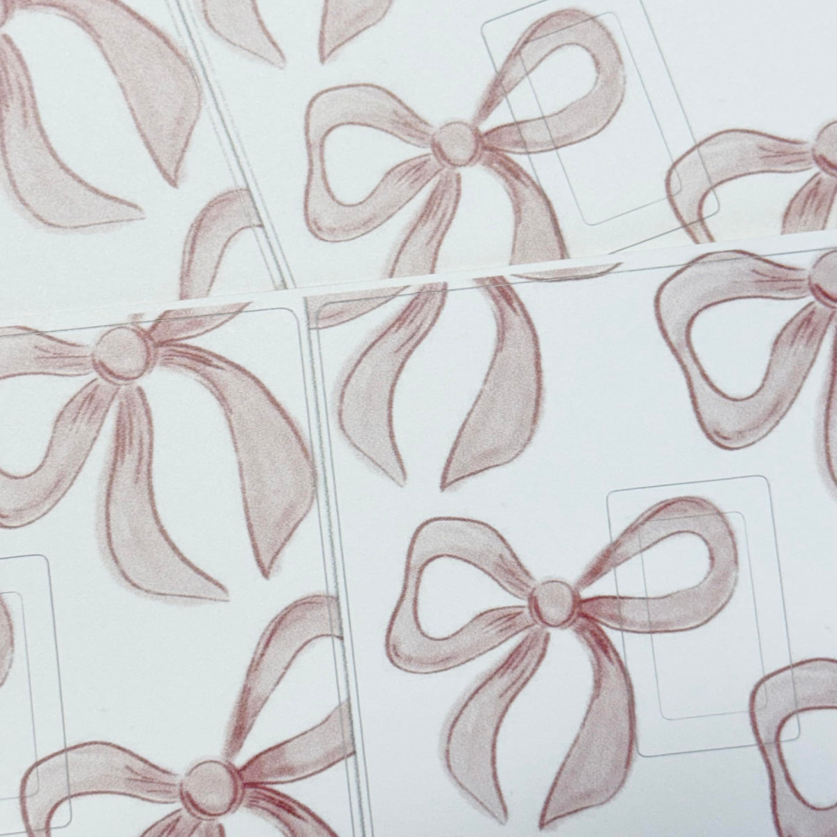 Pink bow nursery decor sticker for a light switch cover