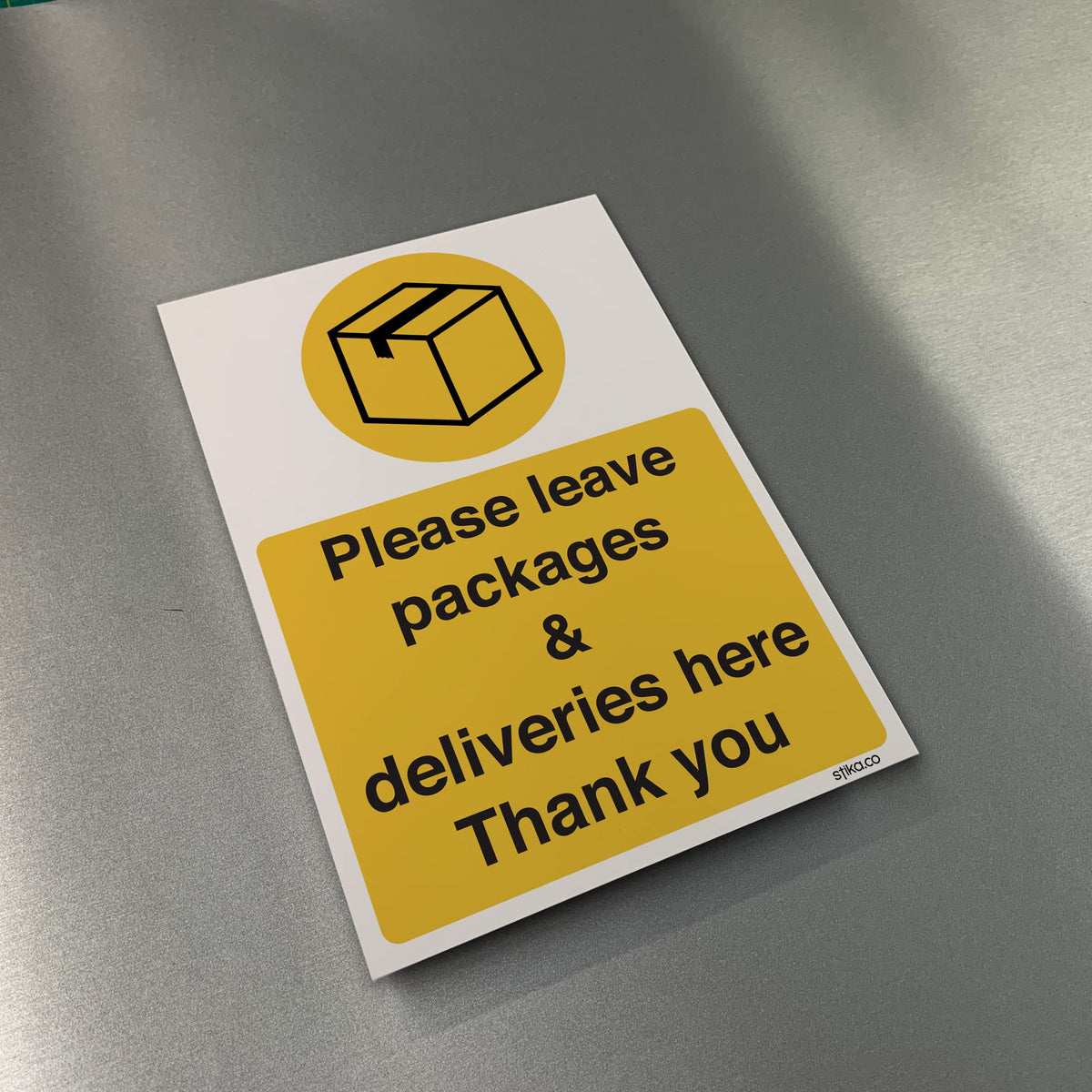 Please Leave All Deliveries Here sign