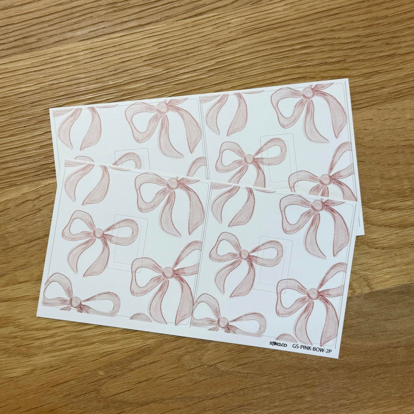 Pink bow light switch sticker detail and fitting example