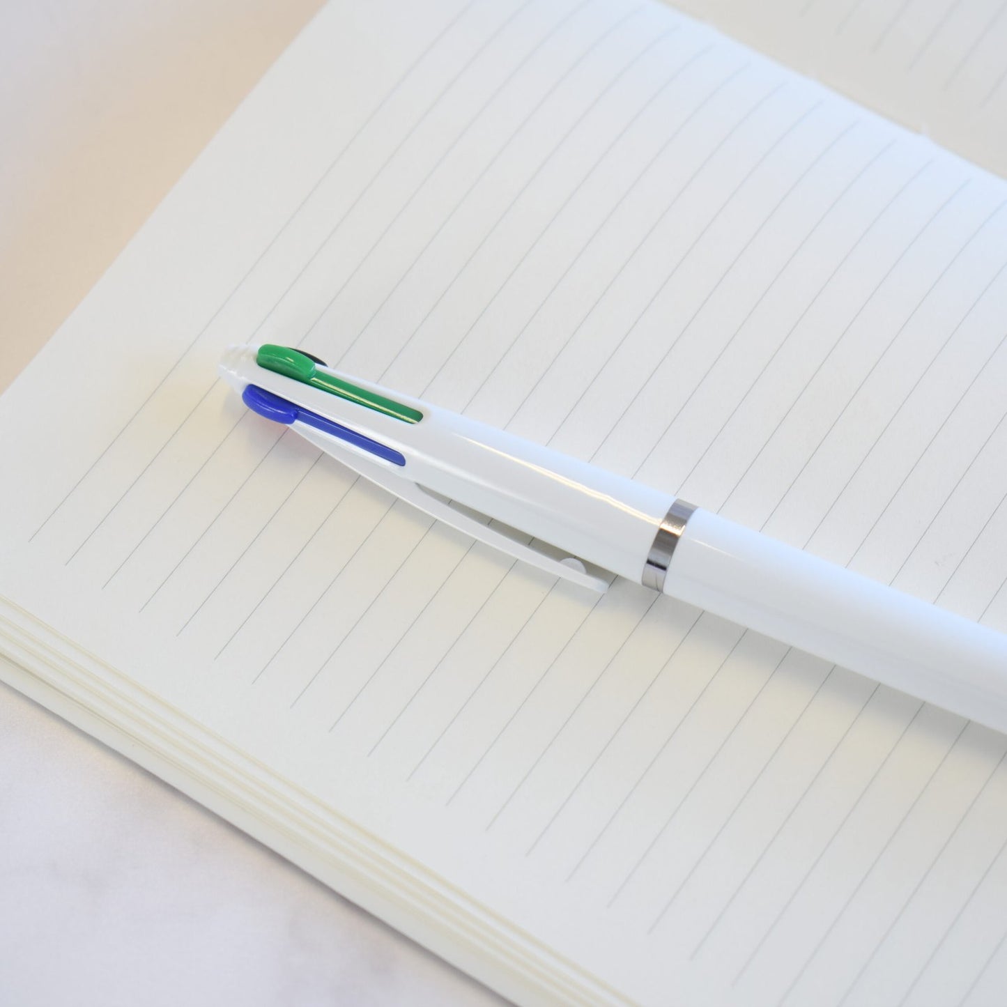 Personalised Quatro Four-Colour Pen custom printed with a business logo