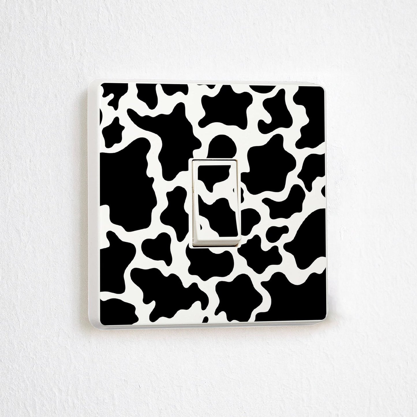 Cow Print vinyl switch surround decal for home decor