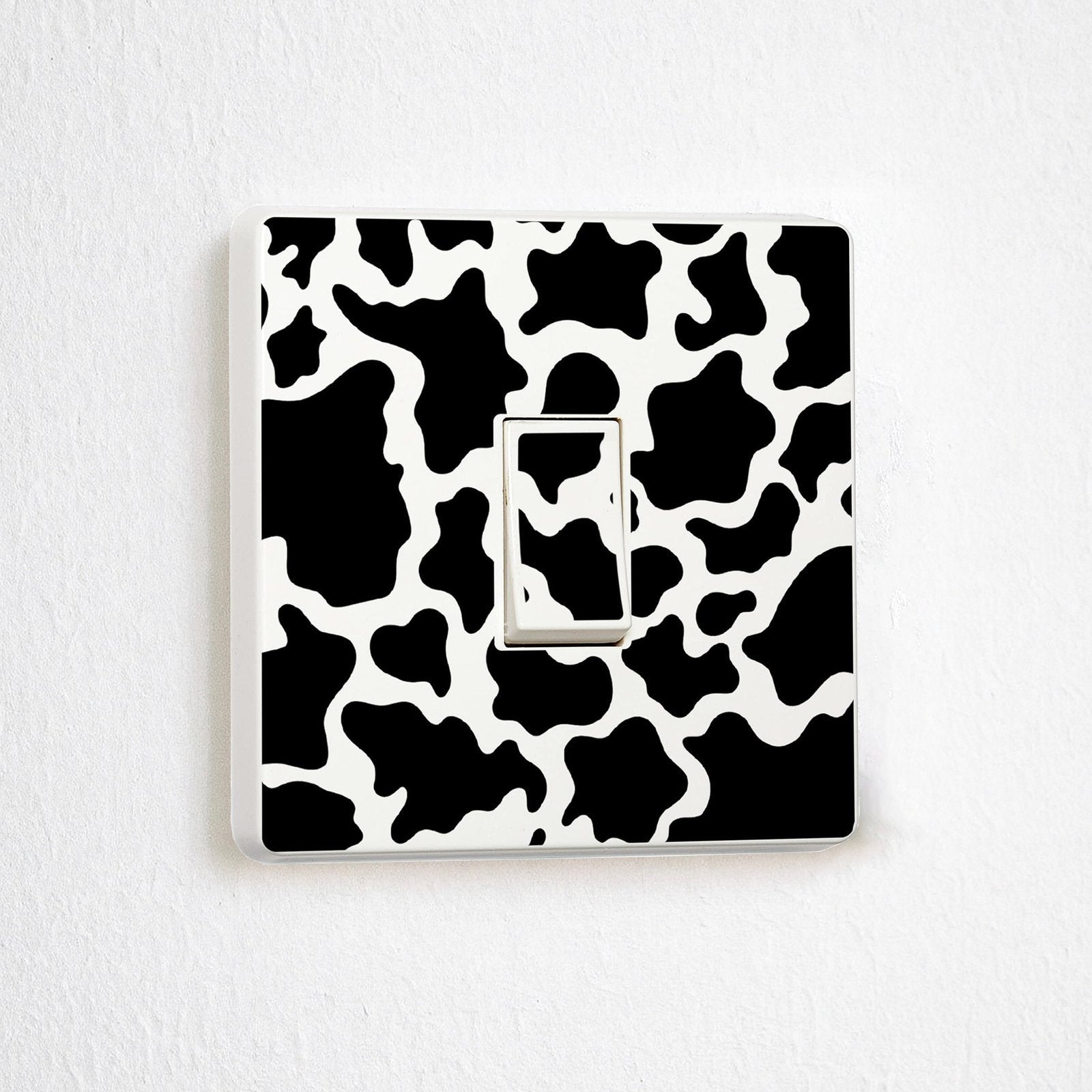 Cow Print vinyl switch surround decal for home decor